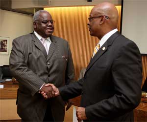 Harold Williams, left, is congratulated by PCC District President Preston Pulliams after Williams won the Pacific Region Trustee Leadership Award in 2010.