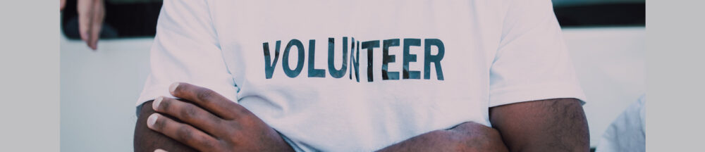 Person wearing a volunteer t-shirt